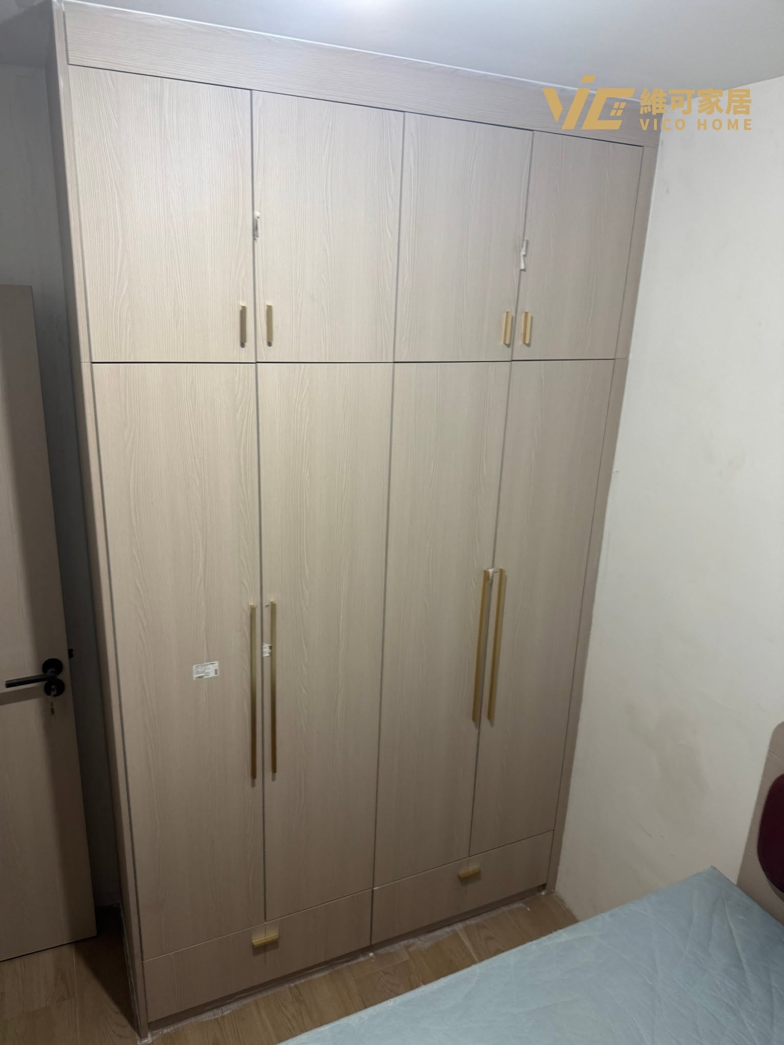 custom-wardrobe-design 5 Hong Kong fitted wardrobe with precision beam and column cutouts | Light beige woodgrain