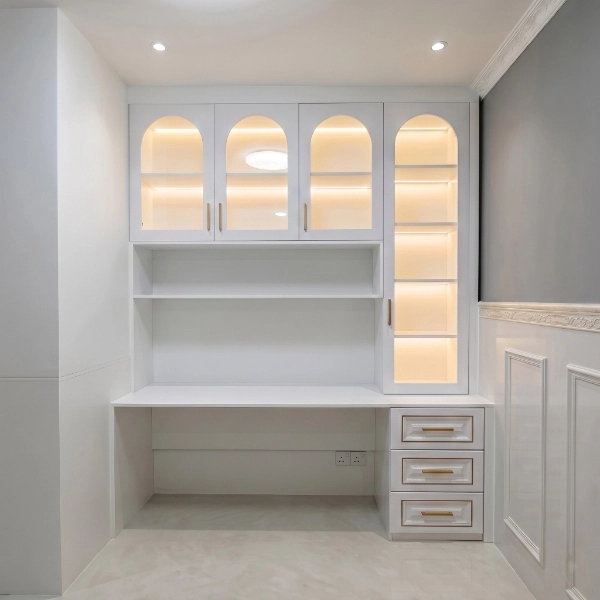 White desk cabinet with curved glass doors and lighting