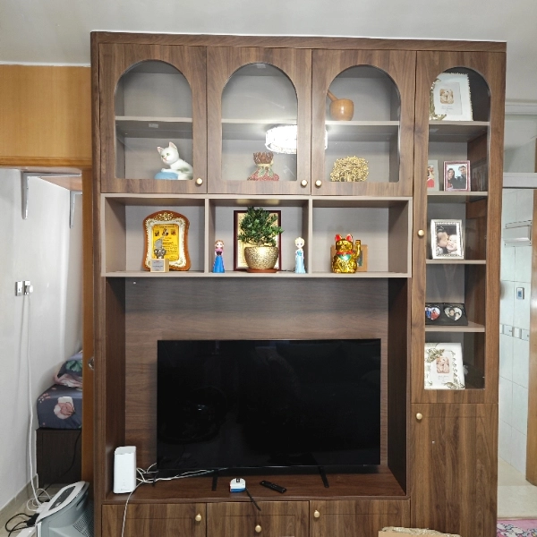 Wood TV cabinet with glass doors and display shelves